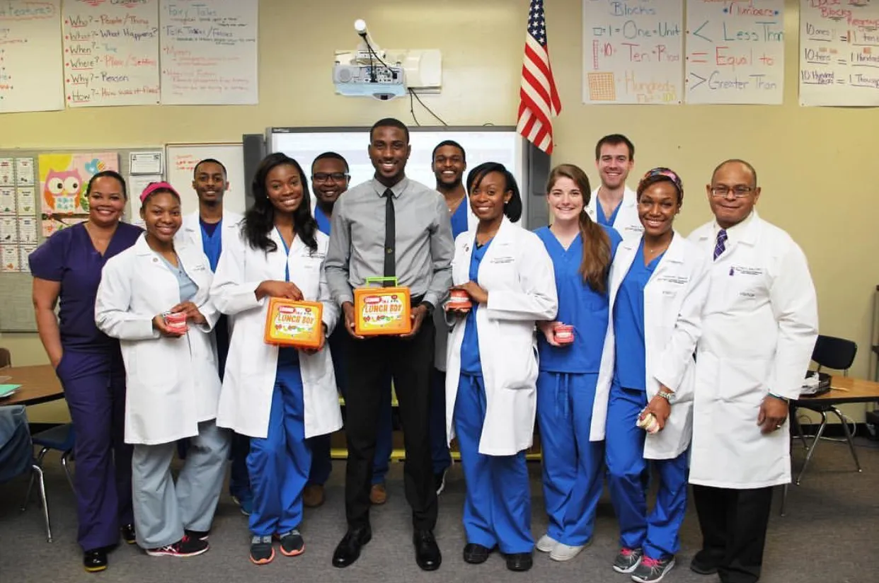 SNDA students leading a community outreach event